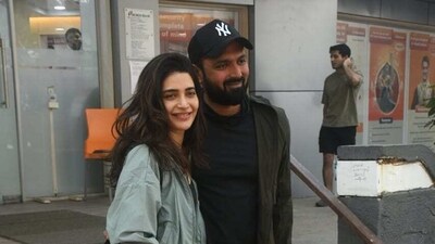 Karishma Tanna was spotted with husband Varun Bangera at a gym in Mumbai. The couple posed for the paparazzi with a big smile on their faces. (Varinder Chawla) Karishma Tanna was spotted with husband Varun Bangera at a gym in Mumbai. The couple posed for the paparazzi with a big smile on their faces. (Varinder Chawla)