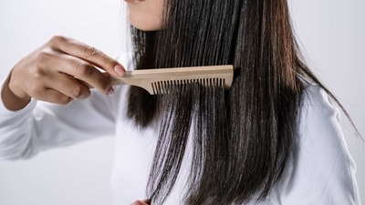Start at the ends: Start detangling at the ends of your hair and work your way up towards the roots. This can help prevent breakage. (Pexels )
