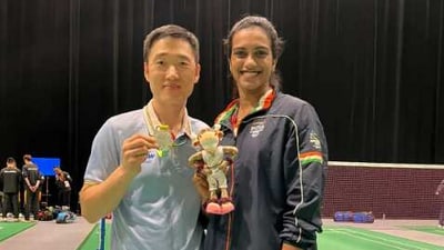 Park Tae-sang (L) with PV Sindhu (Instagram) Park Tae-sang (L) with PV Sindhu (Instagram)