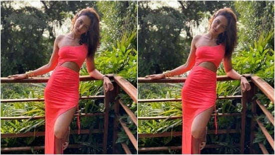 Rakul Preet looked ravishing in the pastel pink gown featuring one-shoulder details with cut-out patterns at the midriff. The bodycon gown also came with one thigh high slit and hugged her shape perfectly.&nbsp;(Instagram/@rakulpreet)