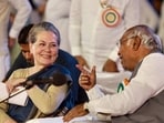 Congress president Mallikarjun Kharge with senior party leader Sonia Gandhi during the 85th Plenary Session of the Indian National Congress, in Raipur, Saturday, Feb. 25, 2023.