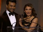 Ram Charan with Anjali Bhimani on stage. Ram Charan with Anjali Bhimani on stage.