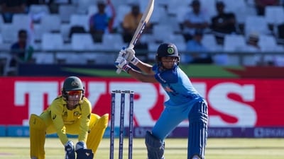 India's Harmanpreet Kaur in action while Australia's Alyssa Healy watches on during the Women's T20 World Cup semi final cricket match in Cape Town. (AP) India's Harmanpreet Kaur in action while Australia's Alyssa Healy watches on during the Women's T20 World Cup semi final cricket match in Cape Town. (AP)