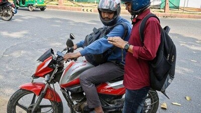 An UberMoto ride at Connaught Place in New Delhi on Monday. (Raj K Raj/HT Photo) An UberMoto ride at Connaught Place in New Delhi on Monday. (Raj K Raj/HT Photo)