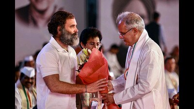 Congress leader and Chhattisgarh CM Bhupesh Baghel greets party leader Rahul Gandhi during the 85th Plenary Session of the Indian National Congress, in Raipur on Saturday. (PTI)