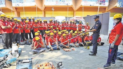 Mumbai, India - February 25, 2023: Trainees being trained by the NDRF team under the Aapda Mitra program which include, rope rescue, flood rescue, and various other rescue operation skills, at Andheri Sports Complex, in Mumbai, India, on Saturday, Feb 25, 2023. (Photo by Vijay Bate/HT Photo) (HT PHOTO) Mumbai, India - February 25, 2023: Trainees being trained by the NDRF team under the Aapda Mitra program which include, rope rescue, flood rescue, and various other rescue operation skills, at Andheri Sports Complex, in Mumbai, India, on Saturday, Feb 25, 2023. (Photo by Vijay Bate/HT Photo) (HT PHOTO)