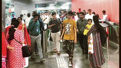 Mumbai, India - January 23, 2023: On first working day after launch of new Metro lines 2A and 7, nearly 1.37 lakh passengers queue up. Many passengers on new metro lines felt the arrangements could have been better with ticket scanning machines encountering technical problems. (HT Photo) (Hindustan Times) Mumbai, India - January 23, 2023: On first working day after launch of new Metro lines 2A and 7, nearly 1.37 lakh passengers queue up. Many passengers on new metro lines felt the arrangements could have been better with ticket scanning machines encountering technical problems. (HT Photo) (Hindustan Times)