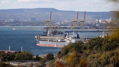 An oil tanker is moored at the Sheskharis complex, part of Chernomortransneft JSC, a subsidiary of Transneft PJSC, in Novorossiysk, Russia, (AP)