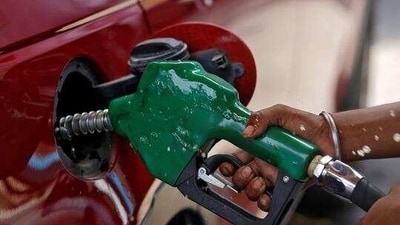 The petrol pump attendant said the car driver first asked him to fill up the tank and then also got several plastic cans filled, leading to a total bill of ₹26,500. (Reuters) The petrol pump attendant said the car driver first asked him to fill up the tank and then also got several plastic cans filled, leading to a total bill of ₹26,500. (Reuters)