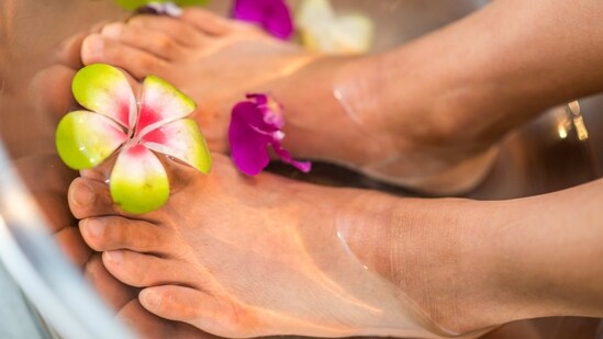 Soak your feet: Soaking your feet in warm water can help soften the skin and make it easier to remove dead skin cells. You can add Epsom salt or essential oils to the water to make it more soothing.&nbsp;(Unsplash)