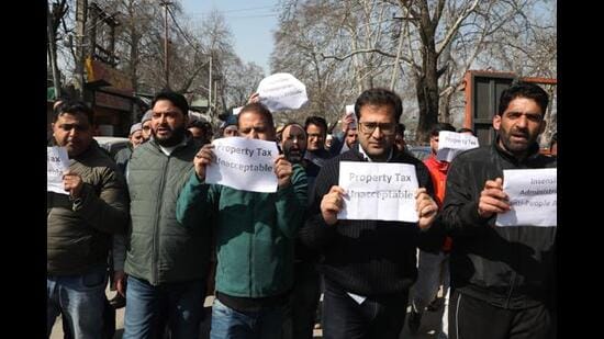 People's Democratic Party supporters protesting against property tax in Srinagar on Saturday. (Waseem Andrabi/HT)