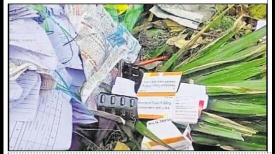 The medicines with an April-2024 expiry date dumped in the trash can at RS Model Senior Secondary School in Ludhiana. (HT Photo)