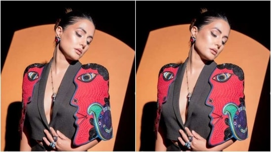 In a sleek neck chain with a black pendant and red stone-studded ear studs, Hina further accessorised her look for the day.&nbsp;(Instagram/@realhinakhan)