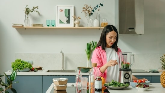 Use a food processor: A food processor can save you a lot of time when chopping vegetables, making sauces, or grinding meat. It's also a great way to make homemade nut butters or hummus.(Pexels)