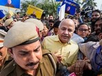 Delhi Police personnel escort Delhi Deputy Chief Minister Manish Sisodia form Rajghat ahead of his questioning by CBI in the liquor policy case, in New Delhi, Sunday, Feb. 26, 2023. Delhi Police personnel escort Delhi Deputy Chief Minister Manish Sisodia form Rajghat ahead of his questioning by CBI in the liquor policy case, in New Delhi, Sunday, Feb. 26, 2023.