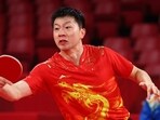 Ma Long of China in action against Sharath Kamal Achanta of India at Tokyo Olympics 2020