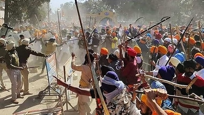 Amritpal Singh's supporters break barricades and enter the police station demanding the release of Amritpal Singh's close aide, in Ajnala near Amritsar on Thursday. (ANI) Amritpal Singh's supporters break barricades and enter the police station demanding the release of Amritpal Singh's close aide, in Ajnala near Amritsar on Thursday. (ANI)