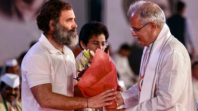 Congress leader and Chhattisgarh CM Bhupesh Baghel greets party leader Rahul Gandhi during the 85th Plenary Session of the Indian National Congress, in Raipur on Saturday. (PTI) (HT_PRINT)