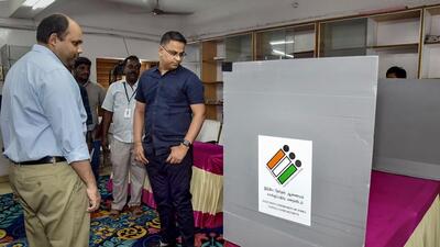 Officials inspect a polling booth ahead of the Erode (East) assembly seat bypoll on Sunday. (PTI)