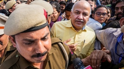 Delhi Police personnel escort Delhi Deputy Chief Minister Manish Sisodia form Rajghat ahead of his questioning by CBI in the liquor policy case, in New Delhi, Sunday, Feb. 26, 2023. (PTI) Delhi Police personnel escort Delhi Deputy Chief Minister Manish Sisodia form Rajghat ahead of his questioning by CBI in the liquor policy case, in New Delhi, Sunday, Feb. 26, 2023. (PTI)