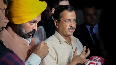 Delhi Chief Minister Arvind Kejriwal with Punjab Chief Minister Bhagwant Mann outside Manish Sisodia's house. (PTI) Delhi Chief Minister Arvind Kejriwal with Punjab Chief Minister Bhagwant Mann outside Manish Sisodia's house. (PTI)