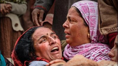 Pulwama: Family members mourn after Sanjay Sharma, a Kashmiri Pandit, was shot dead by terrorists at Achan area in Pulwama district of South Kashmir, Sunday, Feb. 26, 2023. (PTI Photo) (PTI02_26_2023_000177A) (PTI) Pulwama: Family members mourn after Sanjay Sharma, a Kashmiri Pandit, was shot dead by terrorists at Achan area in Pulwama district of South Kashmir, Sunday, Feb. 26, 2023. (PTI Photo) (PTI02_26_2023_000177A) (PTI)