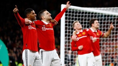 Manchester United's Marcus Rashford and Diogo Dalot celebrate after winning the Carabao Cup final (Action Images via Reuters)