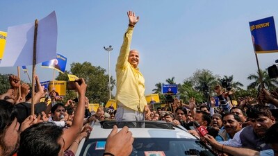 Delhi Deputy Chief Minister Manish Sisodia waves at supporters during a roadshow ahead of his questioning by CBI in the liquor policy case, at Rajghat in New Delhi, Sunday, Feb. 26, 2023. (PTI) Delhi Deputy Chief Minister Manish Sisodia waves at supporters during a roadshow ahead of his questioning by CBI in the liquor policy case, at Rajghat in New Delhi, Sunday, Feb. 26, 2023. (PTI)
