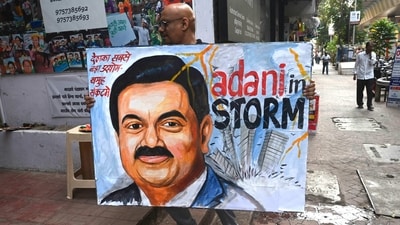 A painting of Gautam Adani in Mumbai highlights the ongoing crisis of the Adani group. (AFP) A painting of Gautam Adani in Mumbai highlights the ongoing crisis of the Adani group. (AFP)
