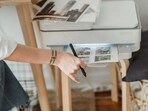 A wireless printer is your solution if you can’t deal with cables.