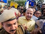 Delhi Police personnel escort Delhi deputy chief minister Manish Sisodia from Rajghat ahead of his questioning by CBI in the liquor policy case on Sunday, Delhi Police personnel escort Delhi deputy chief minister Manish Sisodia from Rajghat ahead of his questioning by CBI in the liquor policy case on Sunday,