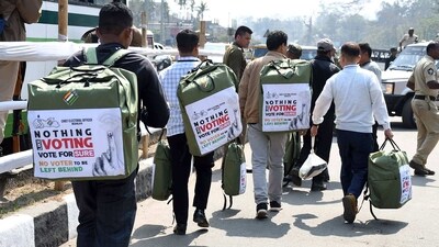 Polling officials with the EVMs and other polling materials head toward their respective polling stations on the eve of the Meghalaya assembly elections at Nongpoh on Sunday. (ANI) Polling officials with the EVMs and other polling materials head toward their respective polling stations on the eve of the Meghalaya assembly elections at Nongpoh on Sunday. (ANI)