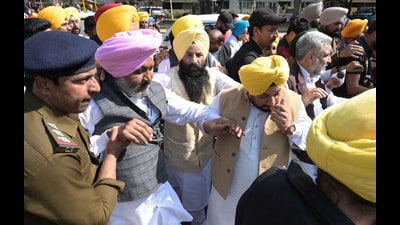 Chandigarh Police arrested Punjab Finance minister Punjab Harpal Cheema and others during AAP protest march towards the Punjab BJP office on Monday. (Photo by Ravi Kumar/Hindustan Times) Chandigarh Police arrested Punjab Finance minister Punjab Harpal Cheema and others during AAP protest march towards the Punjab BJP office on Monday. (Photo by Ravi Kumar/Hindustan Times)