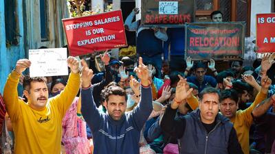Kashmiri Pandits, recruited under PM’s employment package in Kashmir, push for safe relocation, in Jammu on Monday. (PTI) Kashmiri Pandits, recruited under PM’s employment package in Kashmir, push for safe relocation, in Jammu on Monday. (PTI)