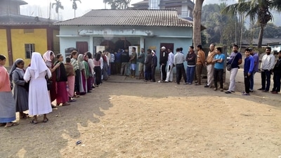 Voters wait in queues to cast their votes at a polling booth during the Meghalaya Assembly elections, in Ri Bhoi district. The counting of votes will be done on March 2. (PTI) Voters wait in queues to cast their votes at a polling booth during the Meghalaya Assembly elections, in Ri Bhoi district. The counting of votes will be done on March 2. (PTI)