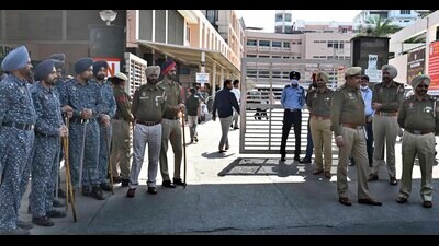 Police personnel outside the Dayanand Medical College and Hospital (DMCH) on Monday. (Gurpreet Singh/HT Photo)
