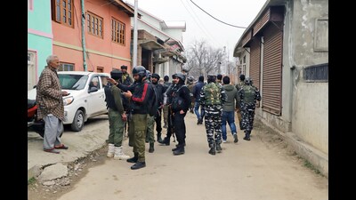 Security personnel cordon off area after a Kashmiri Pandit Sanjay Sharma was shot dead by suspected militants, at Achan, in Pulwama on Sunday (ANI) Security personnel cordon off area after a Kashmiri Pandit Sanjay Sharma was shot dead by suspected militants, at Achan, in Pulwama on Sunday (ANI)