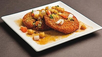 3. Aloo Tikki: This is a popular snack from the state of Uttar Pradesh. It is made with a mashed potato patty, served with a variety of chutneys and spices. It is a delicious snack that can be found on the streets of Lucknow and other cities in the state. (Shutterstock) 3. Aloo Tikki: This is a popular snack from the state of Uttar Pradesh. It is made with a mashed potato patty, served with a variety of chutneys and spices. It is a delicious snack that can be found on the streets of Lucknow and other cities in the state. (Shutterstock)