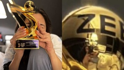 Fans spotted Ranbir Kapoor in Alia Bhatt's trophy photo. Fans spotted Ranbir Kapoor in Alia Bhatt's trophy photo.