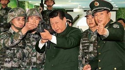 Chinese President Xi Jinping with a QBZ assault rifle. Chinese President Xi Jinping with a QBZ assault rifle.