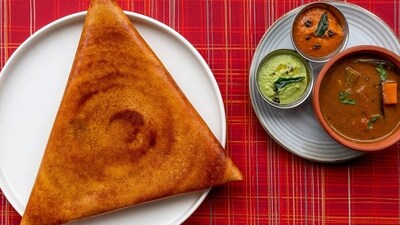 5. Dosa: This is a popular street food from South India. It is made with a thin, rice-based crepe, served with a variety of chutneys and sambar. It is a delicious snack that can be found on the streets of Chennai and other cities in the state. (Photo:Paul Mcdonough) 5. Dosa: This is a popular street food from South India. It is made with a thin, rice-based crepe, served with a variety of chutneys and sambar. It is a delicious snack that can be found on the streets of Chennai and other cities in the state. (Photo:Paul Mcdonough)