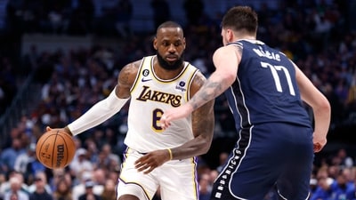 LeBron James #6 of the Los Angeles Lakers handles the ball as Luka Doncic #77 of the Dallas Mavericks defends in the second half at American Airlines Center. (Getty Images via AFP) LeBron James #6 of the Los Angeles Lakers handles the ball as Luka Doncic #77 of the Dallas Mavericks defends in the second half at American Airlines Center. (Getty Images via AFP)