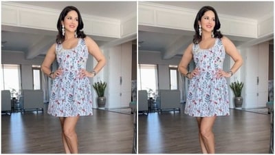In statement white feather earrings and red stilettos, Sunny further accessorised her look for the day. “Loved this dress,” Sunny captioned her pictures. (Instagram/@sunnyleone) In statement white feather earrings and red stilettos, Sunny further accessorised her look for the day. “Loved this dress,” Sunny captioned her pictures. (Instagram/@sunnyleone)