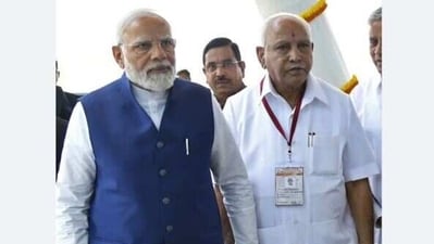 Prime Minister Narendra Modi with former Karnataka Chief Minister BS Yediyurappa at the inauguration of the Shivamogga Airport, on Monday. (ANI Photo)