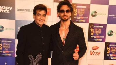 Jeetendra posed with Tiger Shroff on the red carpet. The veteran actor was in a designer bandhgala suit while Tiger was in a black suit and shades. (Varinder Chawla) 