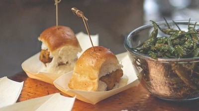 1. Vada Pav: This is a popular snack from the state of Maharashtra. It is made with a deep-fried potato patty, served in a soft bun, and topped with chutney and spices. It is a delicious snack that can be found on the streets of Mumbai and other cities in the state. (Pexels) 1. Vada Pav: This is a popular snack from the state of Maharashtra. It is made with a deep-fried potato patty, served in a soft bun, and topped with chutney and spices. It is a delicious snack that can be found on the streets of Mumbai and other cities in the state. (Pexels)