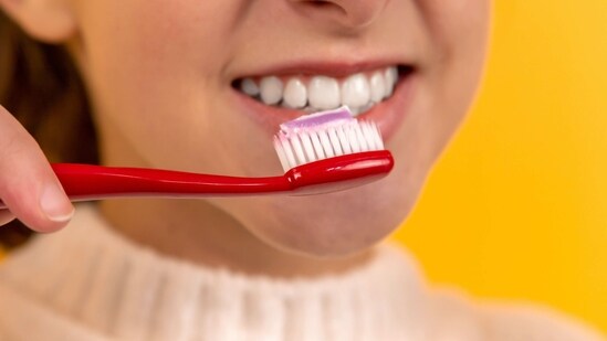 Brush your teeth regularly: Brush your teeth at least twice a day for two minutes each time. Make sure to use a soft-bristled toothbrush and brush gently in circular motions.&nbsp;(Unsplash)