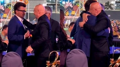 Anupam Kher hugged Anil Kapoor as he celebrated their friendship at an event. Anupam Kher hugged Anil Kapoor as he celebrated their friendship at an event.