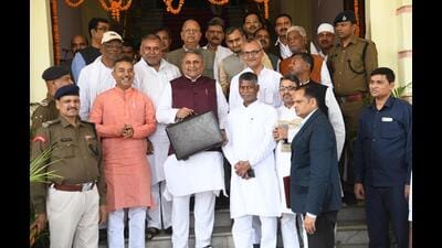 Bihar finance minister Vijay Kumar Choudhary ahead of the budget at the state assembly on Tuesday. (Santosh Kumar/HT Photo) Bihar finance minister Vijay Kumar Choudhary ahead of the budget at the state assembly on Tuesday. (Santosh Kumar/HT Photo)