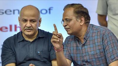 In this file photo dated July 29, 2018, Delhi Deputy Chief Minister Manish Sisodia with Delhi Health Minister Satyendar Jain, in New Delhi. Sisodia and Jain on Tuesday resigned from the Cabinet, amid corruption allegations against them. (PTI)